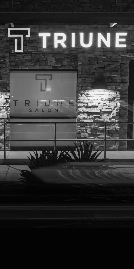 Black and white photograph of the Triune Salon studio